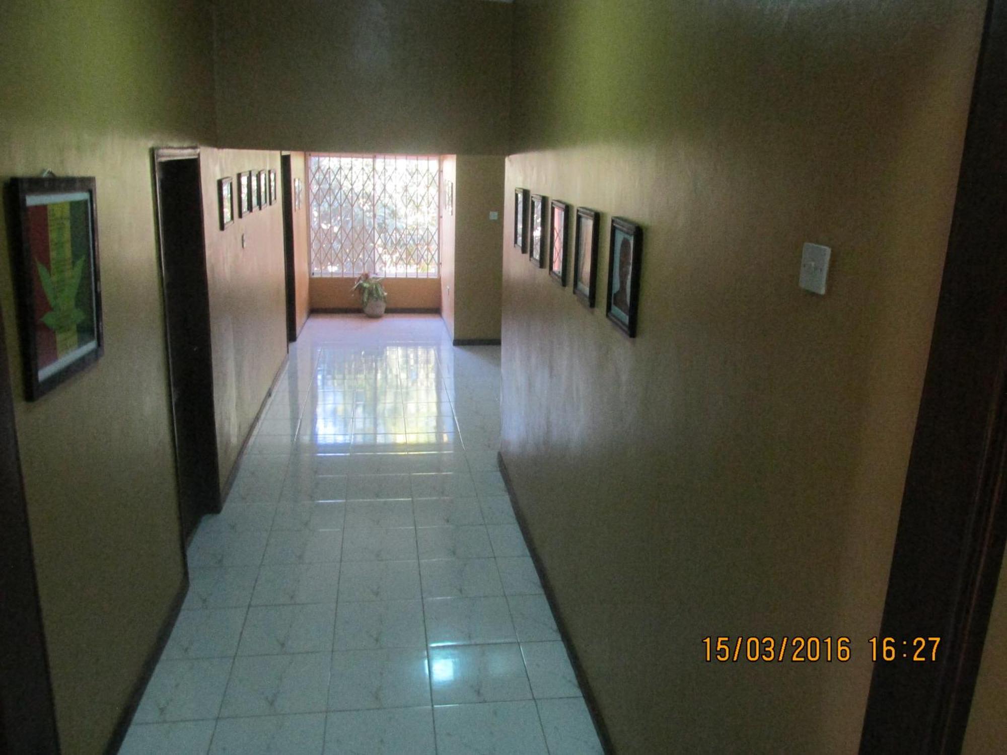 Jamaica Inn Guest House Botianaw Bagian luar foto